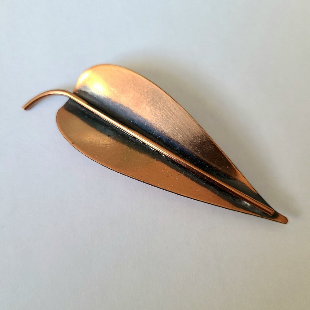 Large copper leaf shape brooch.